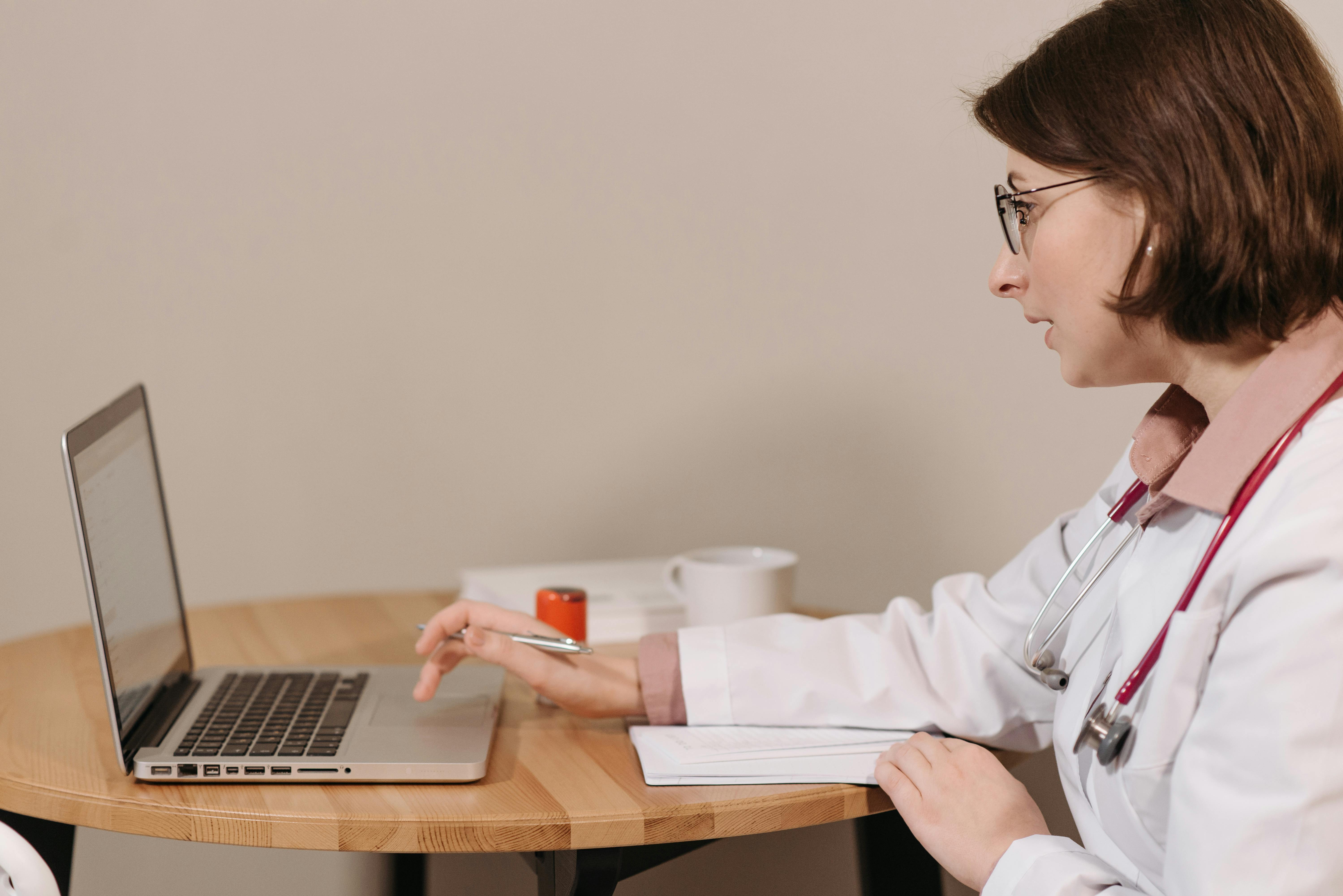 Desk-based communication work with a laptop